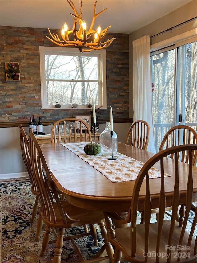 dining area featuring a chandelier