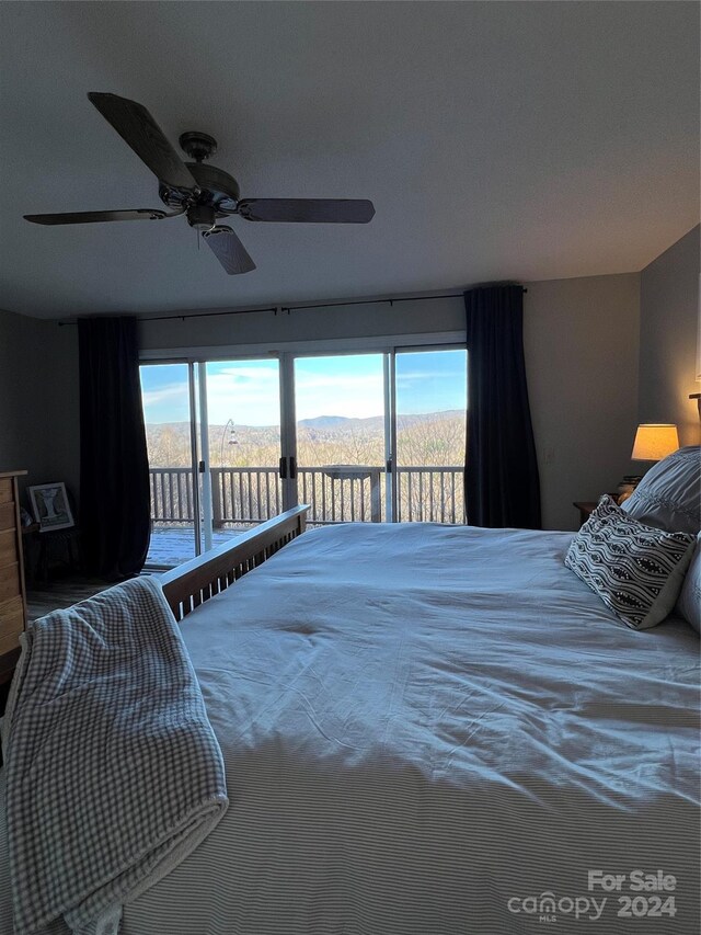 bedroom featuring carpet, ceiling fan, and access to outside