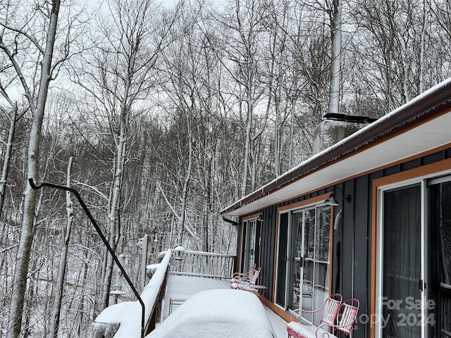 view of snow covered deck