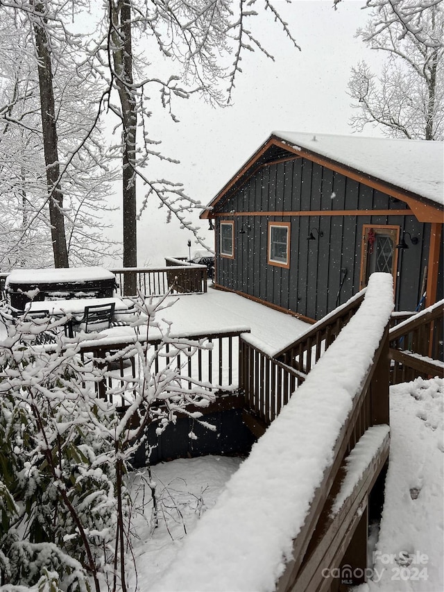 view of snow covered deck