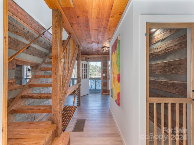 1679 Woods Mountain Trl, Cullowhee, NC 28723 - hall featuring wooden ceiling, wood finished floors, and stairs