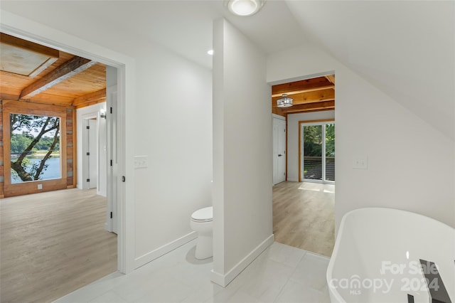 1679 Woods Mountain Trl, Cullowhee, NC 28723 - bathroom featuring beamed ceiling and wood finished floors