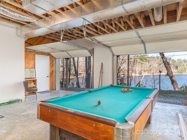 rec room with billiards and concrete floors