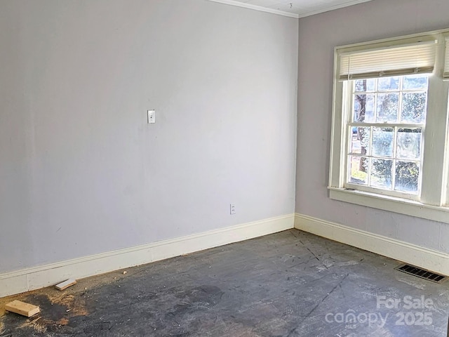 spare room featuring a wealth of natural light