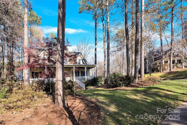 view of yard with a porch