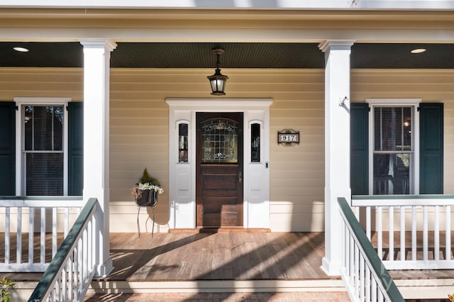 entrance to property with covered porch