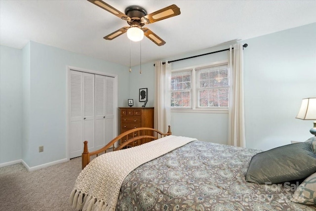 bedroom featuring light carpet, a closet, and ceiling fan