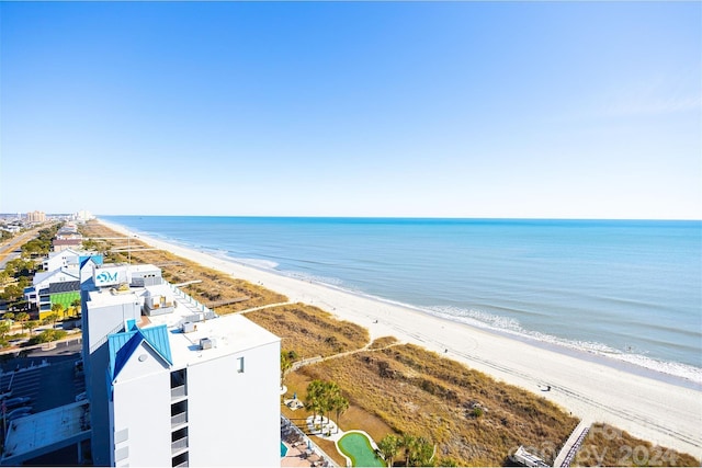 bird's eye view with a view of the beach and a water view