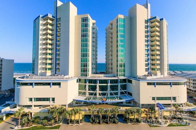 view of building exterior featuring a water view