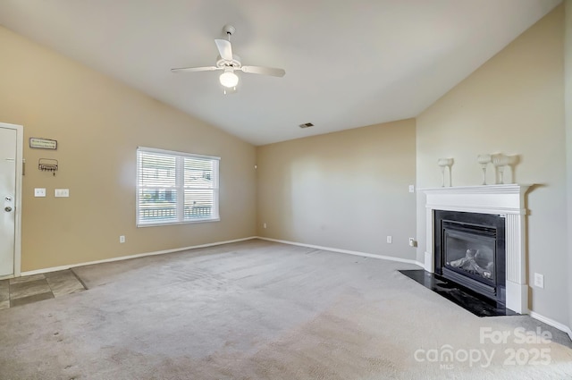 unfurnished living room featuring light carpet, ceiling fan, and lofted ceiling