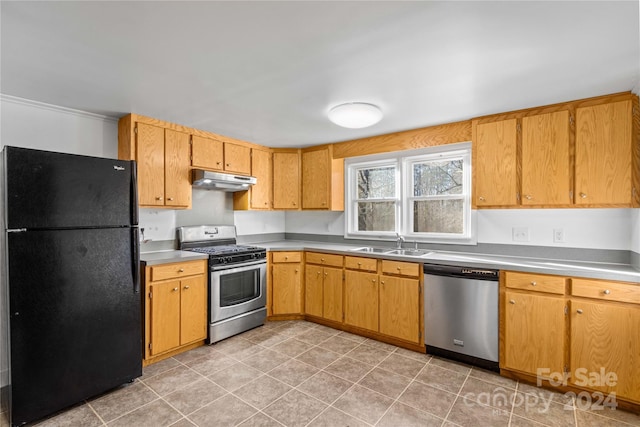 kitchen with appliances with stainless steel finishes and sink