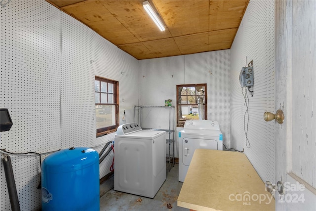 clothes washing area featuring washing machine and dryer