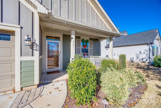 doorway to property with covered porch