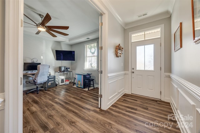 foyer featuring ceiling fan, dark hardwood / wood-style floors, and ornamental molding