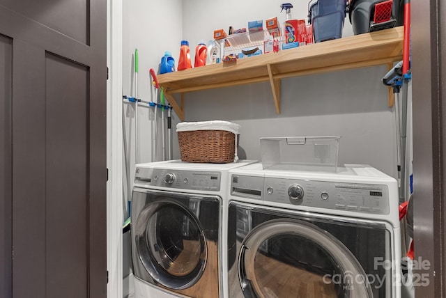 laundry area featuring laundry area and washer and clothes dryer