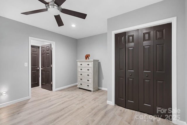 bedroom with recessed lighting, a closet, a ceiling fan, wood finished floors, and baseboards