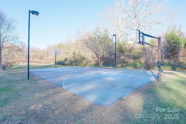 view of sport court with community basketball court and a yard