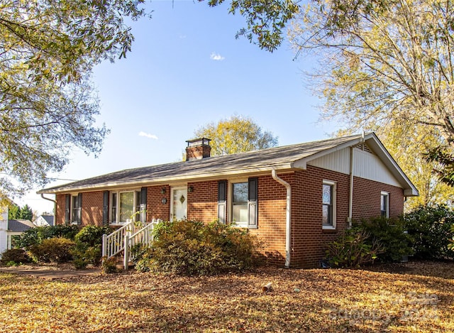 654 Meadowlark Dr, Winston Salem, NC 27106 - ranch-style home with brick siding and a chimney