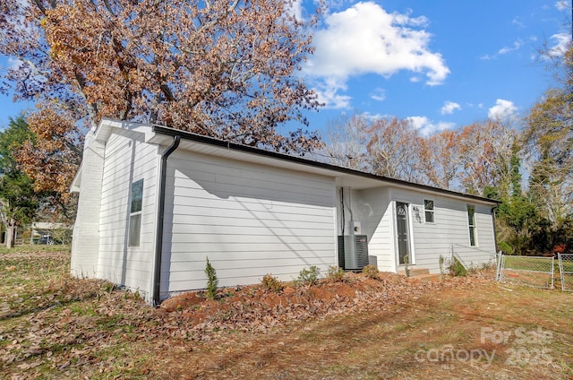 exterior space featuring central AC unit