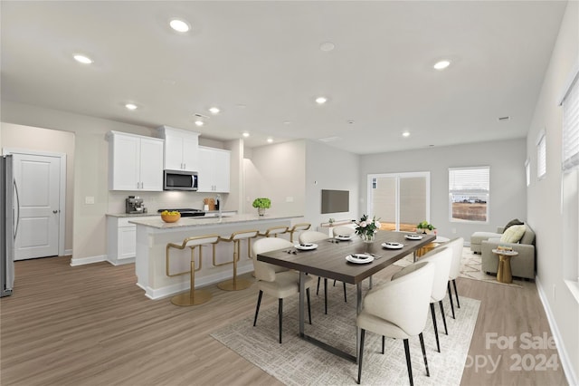 dining area featuring light hardwood / wood-style floors