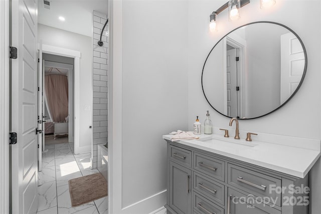 bathroom featuring shower / bath combination and vanity