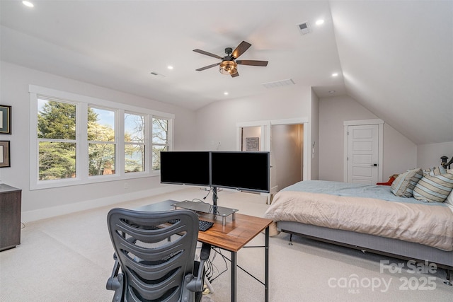 bedroom featuring ceiling fan, light colored carpet, and lofted ceiling