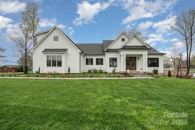 modern farmhouse featuring a front lawn