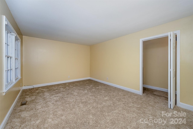 view of carpeted empty room