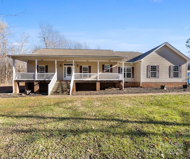 view of front facade featuring a porch and a front lawn