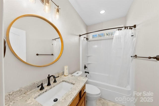 full bathroom with vanity, shower / bath combination with curtain, and toilet