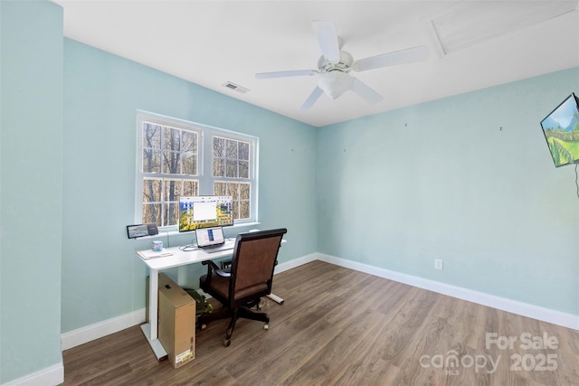 home office featuring wood-type flooring and ceiling fan