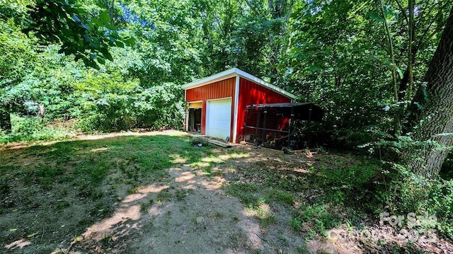 view of outdoor structure featuring a garage