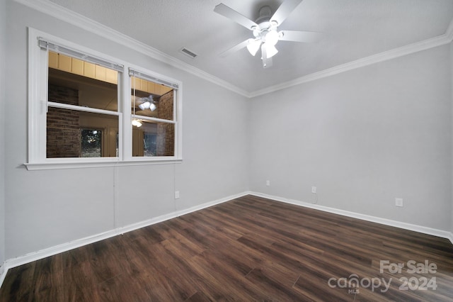 unfurnished room featuring ceiling fan, dark wood-type flooring, a textured ceiling, and ornamental molding