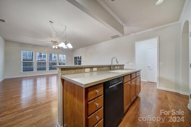 kitchen featuring sink, black dishwasher, pendant lighting, a center island with sink, and light wood-type flooring