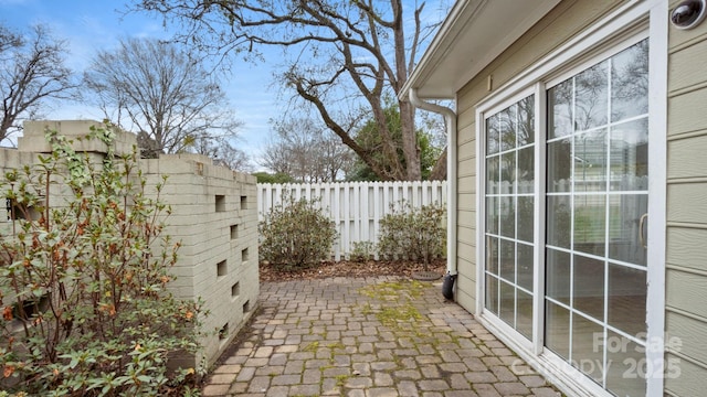 view of patio with fence