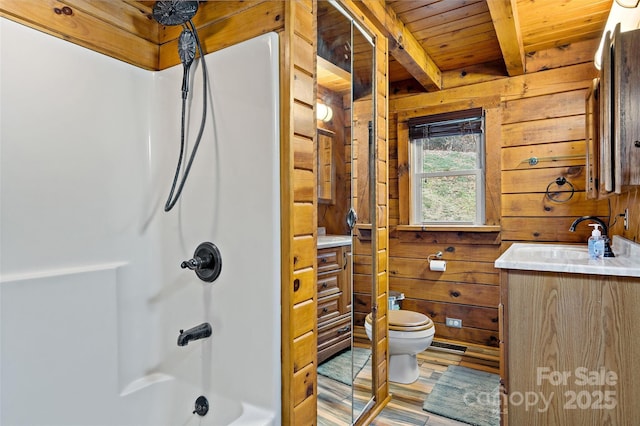 full bathroom featuring wood ceiling, vanity, wooden walls, beamed ceiling, and toilet