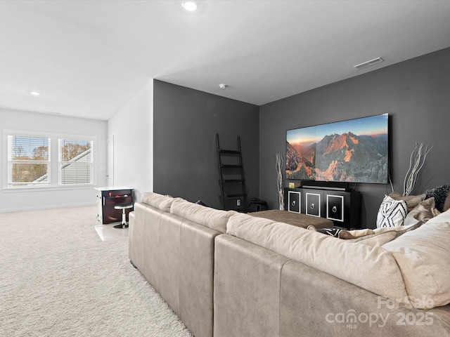 home theater room with light carpet, baseboards, visible vents, and recessed lighting