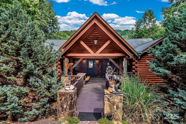 view of log cabin