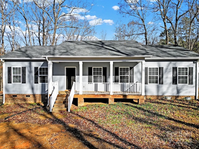 ranch-style home featuring covered porch