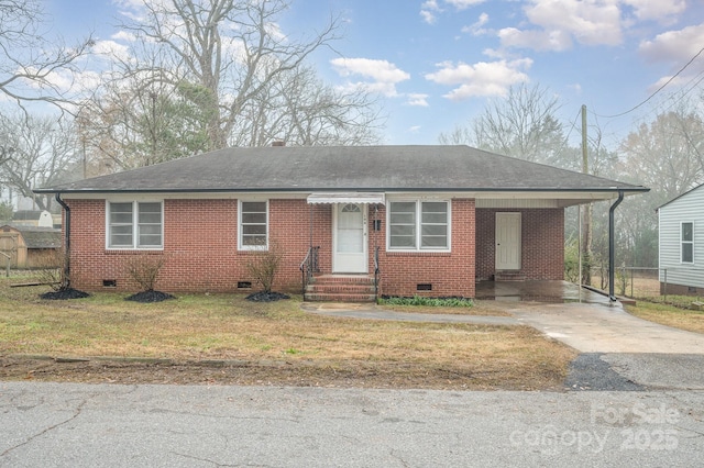 view of front of home with crawl space, driveway, roof with shingles, and brick siding