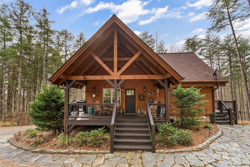 log home with a porch