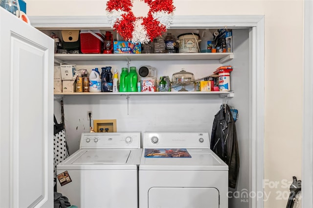 laundry room with washer and dryer