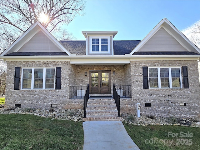 view of front facade featuring a porch and a front lawn