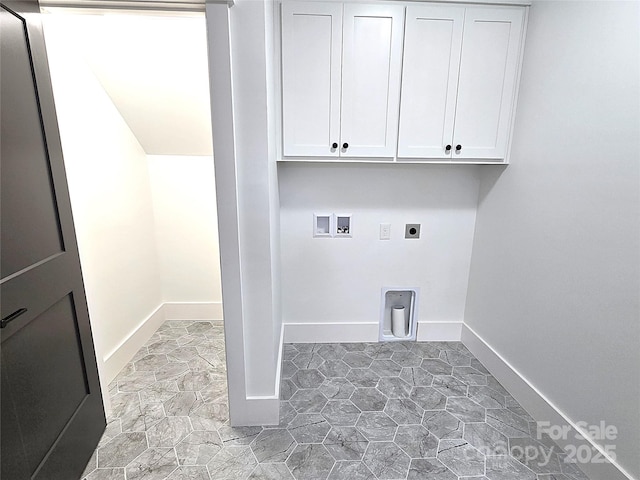 laundry room featuring cabinets, hookup for a washing machine, and electric dryer hookup