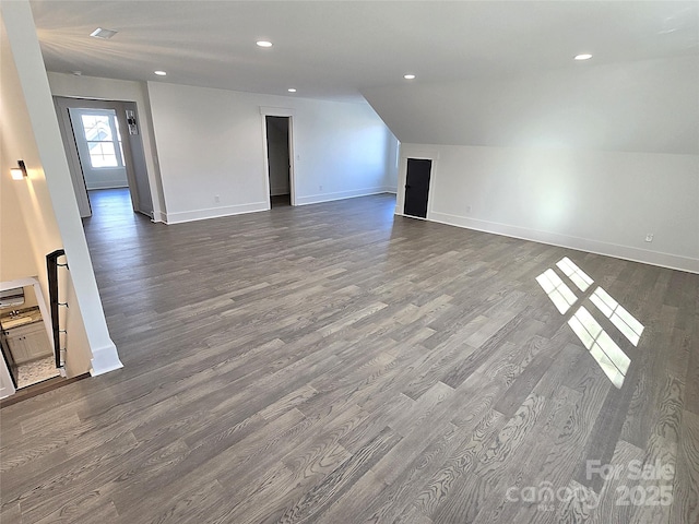 unfurnished living room with lofted ceiling and hardwood / wood-style floors