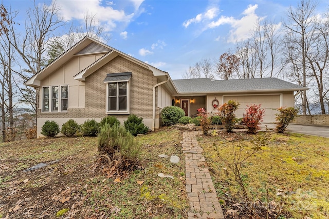 ranch-style home with a garage