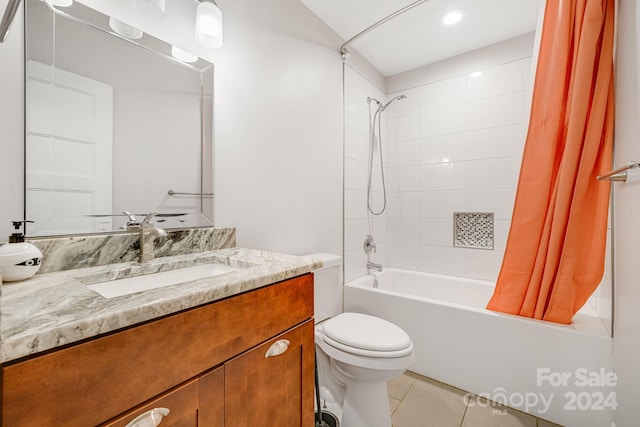 full bathroom featuring tile patterned floors, shower / bath combo, toilet, and vanity