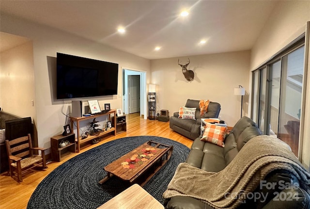 living room with light hardwood / wood-style flooring