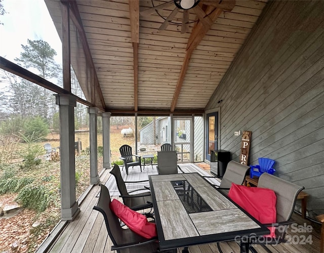 wooden deck featuring ceiling fan