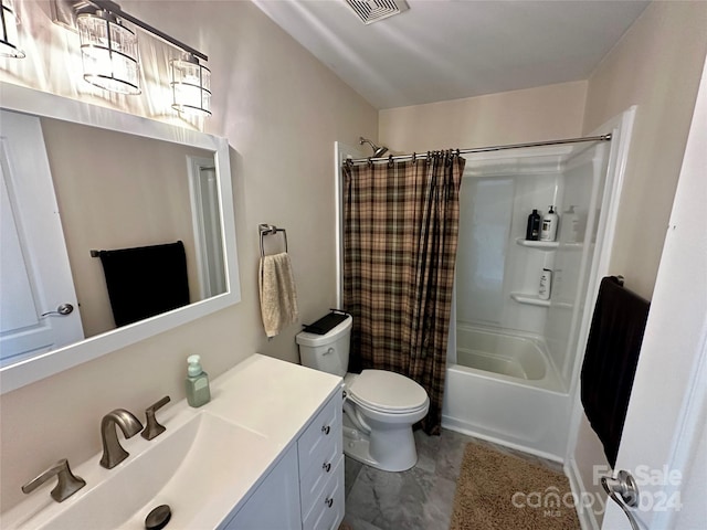 full bathroom with vanity, shower / bath combo, and toilet